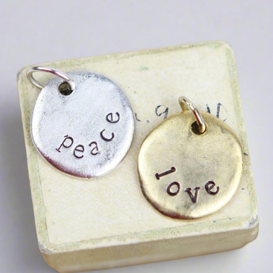 Custom hand stamped round jewelry charm